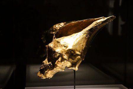 Bogota, Colombia - 30 January 2026. Gold snail shell at the Museum of Gold an archeology museum located in Bogota, Colombia.のeditorial素材