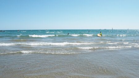 Swimming at the beachのeditorial素材