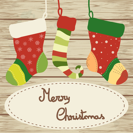 Vintage  invitation card design with Christmas socks on wooden backgroundのイラスト素材