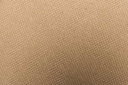 Close-up of beige fleece fabric, material texture backgroundの写真素材