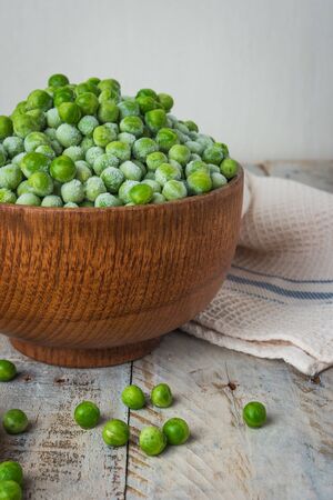 Fresh frozen peas. Vegetable food background healthy vegetarian natural meal.の写真素材