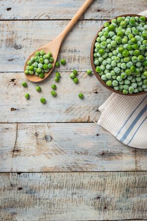Fresh frozen peas. Vegetable food background healthy vegetarian natural meal.の写真素材