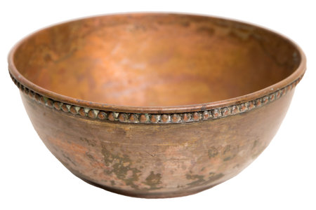 Old vintage copper bowl handmade isolated on whiteの写真素材