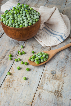 Fresh frozen peas. Vegetable food background healthy vegetarian natural meal.の写真素材