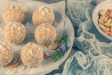 Homemade sweet white chocolate and coconut in a plate. Raffaello candy - snowball truffles on a...