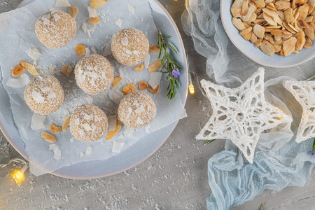 Homemade sweet white chocolate and coconut in a plate. Raffaello candy - snowball truffles on a...