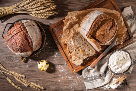 Freshly artisan baked beetroot, heat and rye bread, country bread. Simple bread  with butter for...