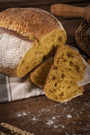 Freshly artisan baked wheat, turmeric and rye bread, country bread. Simple bread for breakfast