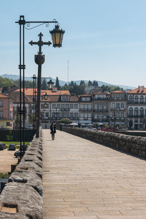 PONTE DE LIMA, PORTUGAL - CIRCA APRIL 2018: Roman bridge crossing the Rio Lima in Ponte de Lima on the Camino de Santiago.のeditorial素材