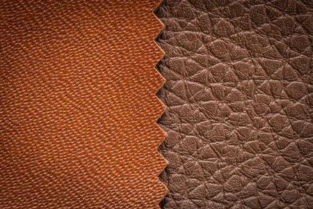 Brown artificial or synthetic leather background with neat texture and copy space, colorful fabric sample with leather-like finish aimed for upholstery, fashion, sewing or footwear projectsの写真素材