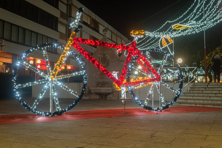 AGUEDA, PORTUGAL - CIRCA DECEMBER 2022: Street in the city of Agueda, Portugal, at night and with Christmas decoration.のeditorial素材