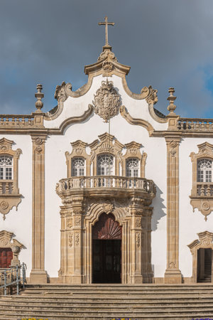 View at the front facade at the Church of Mercy, Igreja da Misericordia, baroque style monument, architectural icon of the city of Viseu, in Portugal.の写真素材