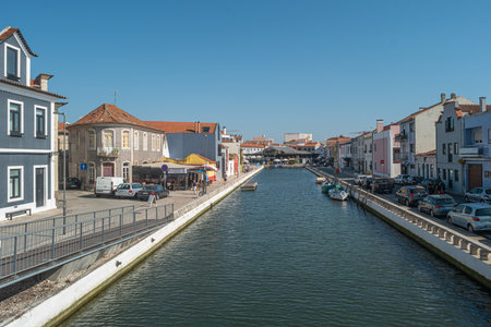 AVEIRO, PORTUGAL - AUGUST 3, 2020: Aveiro canal gondola-style boats in Portugal. Aveiro is known as the Venice of Portugal because of its canals.のeditorial素材