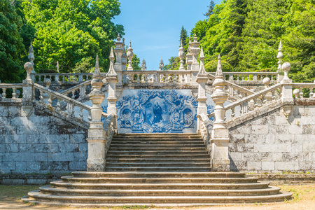 LAMEGO, PORTUGAL - MAY 12, 2019: Azulejo decorated stairway to the Sanctuary of Our Lady of Remedios in Lamego - Portugalのeditorial素材