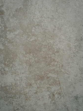 Detailed close-up of an ash grey matt tile featuring a realistic aged stone or concrete texture with subtle variations and marks, perfect for backgroundsの写真素材