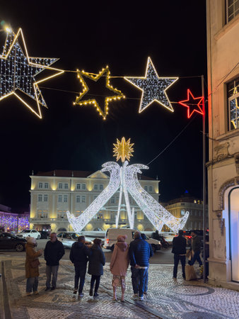 Aveiro, Portugal - December 1, 2025. Colossal LED star and other elaborate light installations illuminate Aveiro Portugal streets and squares during the festive Christmas seasonのeditorial素材