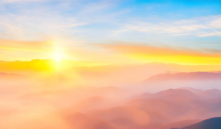 Sunrise over the misty mountains. Beautiful nature landscape background.の素材