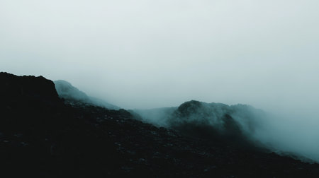 Misty Mountain Landscape Dark Rocks Foggy Scene Nature Photography Dramatic Hills Atmospheric Viewの素材