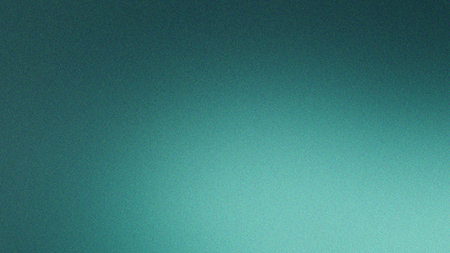 A textured teal background with a gradient effect that transitions from dark to light creating a visually appealing and calming atmosphere perfect for wallpapers and design elementsの素材