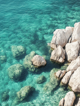 Crystal Clear Turquoise Water Ocean Rocks Summer Beach Scene sea sun day sky calm blue view sandの素材