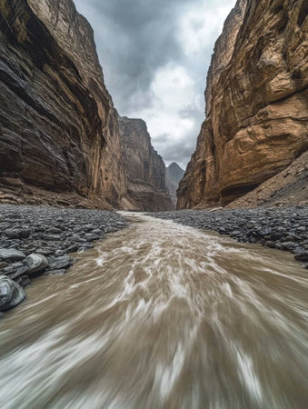 Dramatic Mountain River Gorge Landscape Stunning Nature Scene Powerful Water Flowing Through Rockyの素材