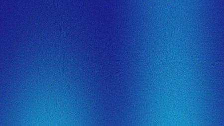 A smooth blue gradient background transitioning from dark navy to bright aqua, enhanced with a subtle grainy noise texture. This vibrant yet calming abstract design is perfect for modern digital projects, web design, social media posts, presentations, and artistic backdrops, offering a contemporary and dynamic visual appeal.の素材