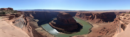 A scenic view of a winding river in a canyon.の素材