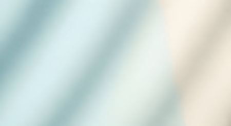 Blurred abstract background. Light blue and beige colors. Copy space.の素材