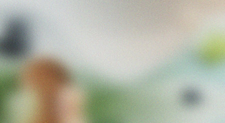 This image features a vibrant, grainy gradient background with a soft focus effect, creating a blurred abstract wallpaper design, ideal for use in various graphic design projects, presentations, or as a decorative element in digital media, adding a touch of color and visual interest.の素材