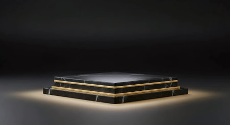 3d rendering of a black podium on a dark background with a spotlightの素材