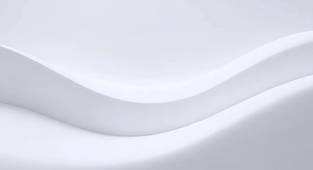 The image showcases a minimalist design featuring soft, flowing waves that create a gentle gradient effect. The waves transition smoothly from a lighter shade of gray at the top to a slightly darker tone towards the bottom, creating an abstract and serene visual. The overall composition is clean and modern, evoking a sense of calm and simplicity.の素材