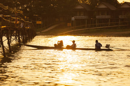 VANG VIENG, LAO P.D.R. - JULY 12 : Unidentified tourists are on long-tailed boat tour in Song River on July 12, 2012 in Vang Vieng, Lao P.D.R.のeditorial素材