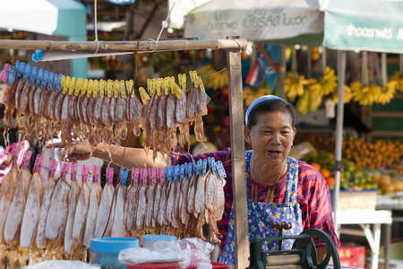 PATTAYA, THAILAND - MARCH 20 , 2012: female shopkeeper, in Koh Larn ( Larn Island ) on March 20, 2012 in Pattaya, Thailand.のeditorial素材