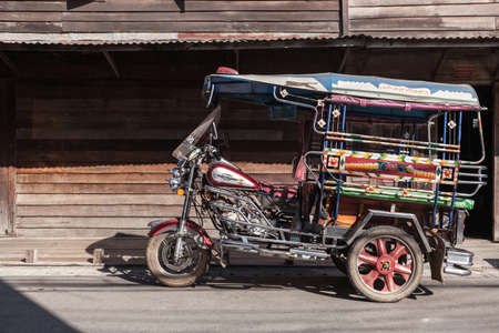 Chaing Khan, Loei, Thailand. - February,02,2014: The classical auto rickshaw is the unique vehicle style of local transportation in any province of Thailand .のeditorial素材