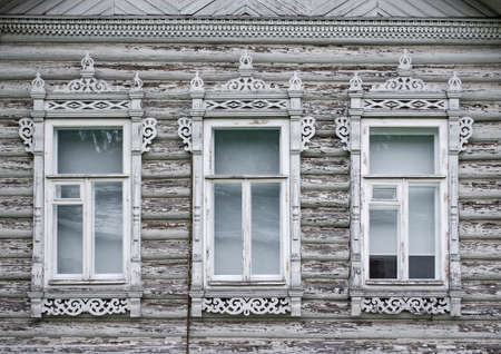 Wooden Windows. Wooden architecture. Craftsmanship. Old masters of Russia. Carved shutters.の写真素材