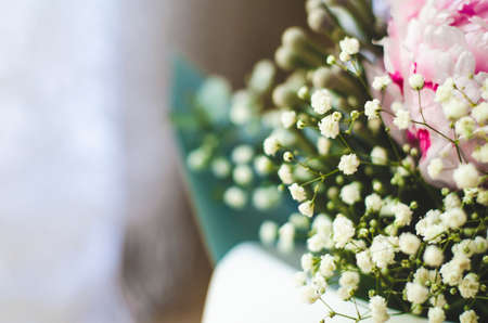 Bouquet of flowers close-up. Joyful mood, a gift from a loved one. Summer flowers. Peonies, hydrangea and others. Soft focus.の写真素材