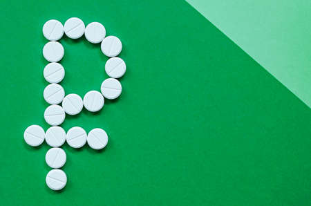 The concept of health. Spending money to buy pills. Money for treatment. Payment in rubles.の写真素材