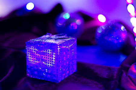 New Year's gift. Neon colorful background. Blur Close-up. LED garland. New Year.の写真素材