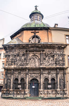 Medieval monument in the center of Lvov - tomb is made from stone with beautiful sculpturesの写真素材