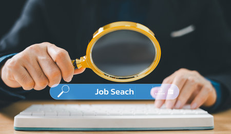 Student or businessman use magnifying glass,  computer keyboard to search information. Website for business work research technology or hunting job communication. Success internet marketing web.の写真素材