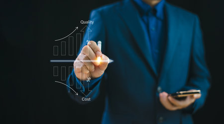Cost efficient and quality increase control, business budget strategy, project management concept. Businessman work on computer growth graph productivity. Cost reduction effective analysis marketingの写真素材
