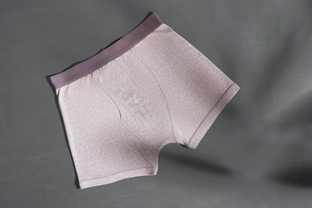 Men's underpants on a gray background. View from above.の写真素材