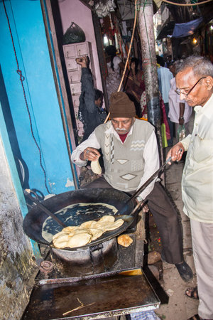 A cook shop in the small streets of the old city of Varanasi