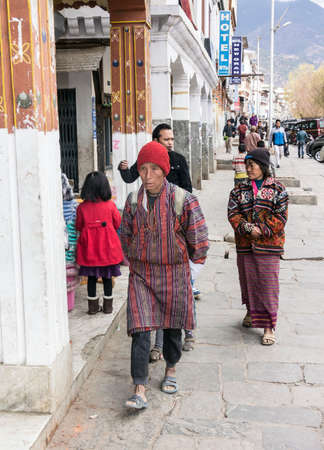 A man in Thimpu, whearing the traditional bhutanese costumeのeditorial素材