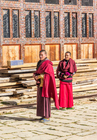 two monks at gangtey monastery, a well known monastery in Phobjikha valley, Bhutanのeditorial素材
