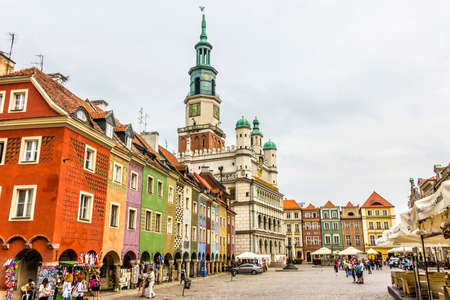 City hall and colorful historic houses from the 16th century at the old market of Poznan, Poland  In the background is the pilloryのeditorial素材