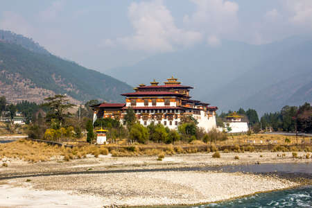 The majestic dzong of Punakha, Bhutan, is situated between two rivers  Dzongs are fortress like buildings which house a monastery and administrative offices のeditorial素材