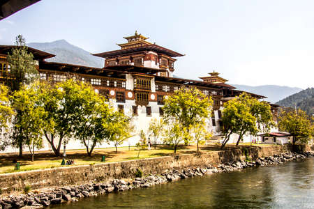 The majestic dzong of Punakha, Bhutan, is situated between two rivers  Dzongs are fortress like buildings which house a monastery and administrative offices のeditorial素材