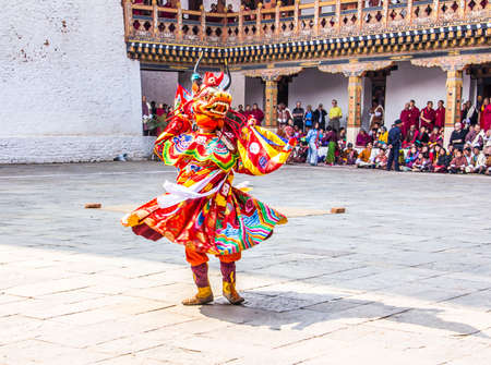 masked dancers at  drupchen festival in the dzong of Punakha, Bhutan  Drupchen festival is taking place yearly in march のeditorial素材