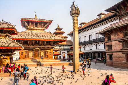 People, pigeons, pagodas and temples in Durbar square, Kathmandu, Nepal.のeditorial素材